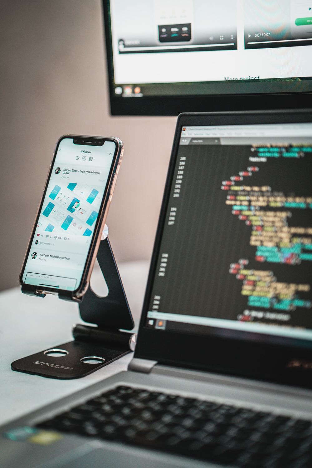 appfarms software developer at her workstation in front of a code editor